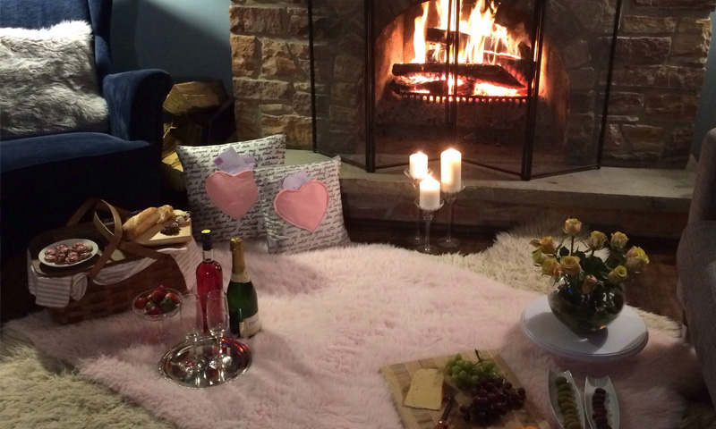 Romantic ideas at home this Valentine&rsquo;s Day fire side picnic image